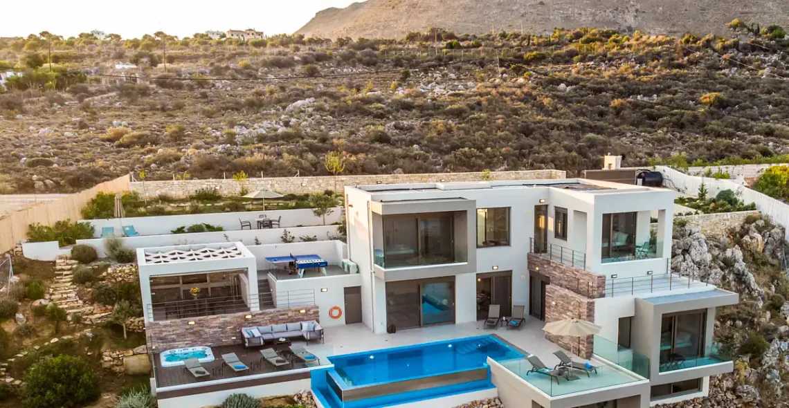 Perched high on the cliffs over the bay of Souda near to Chania in Crete, villa Akri