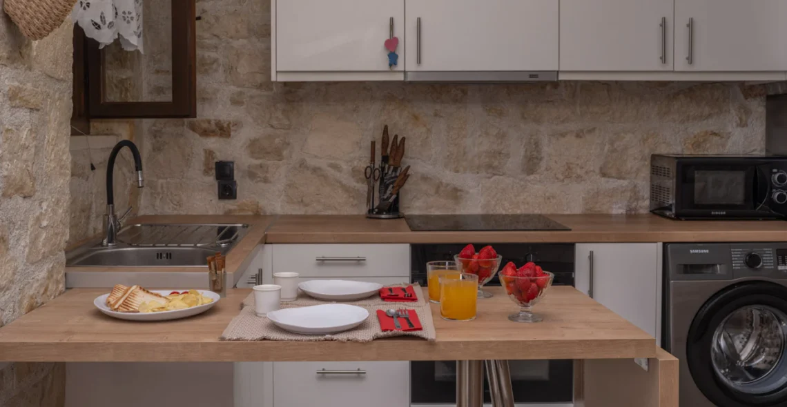 Thyme Apartment: Open-plan kitchen